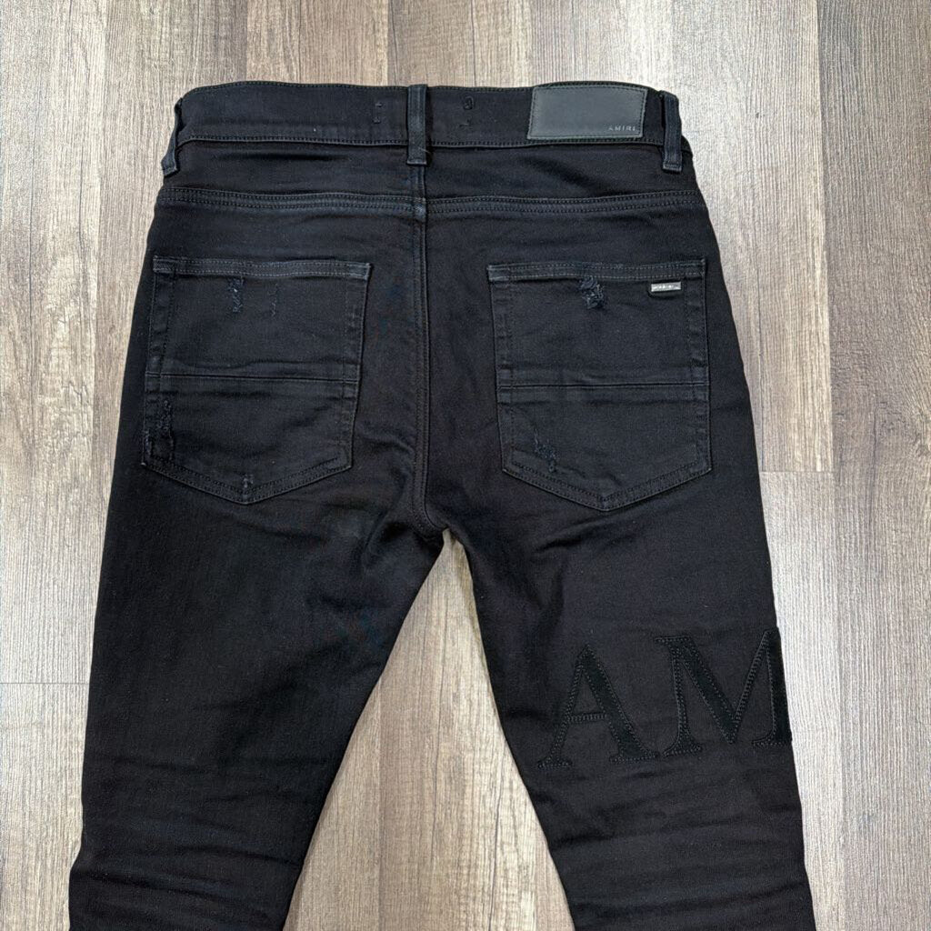 Amiri Jean Black Oblique Logo