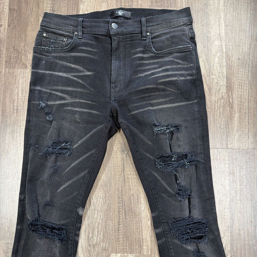 Amiri Jean Black Ripped Knee