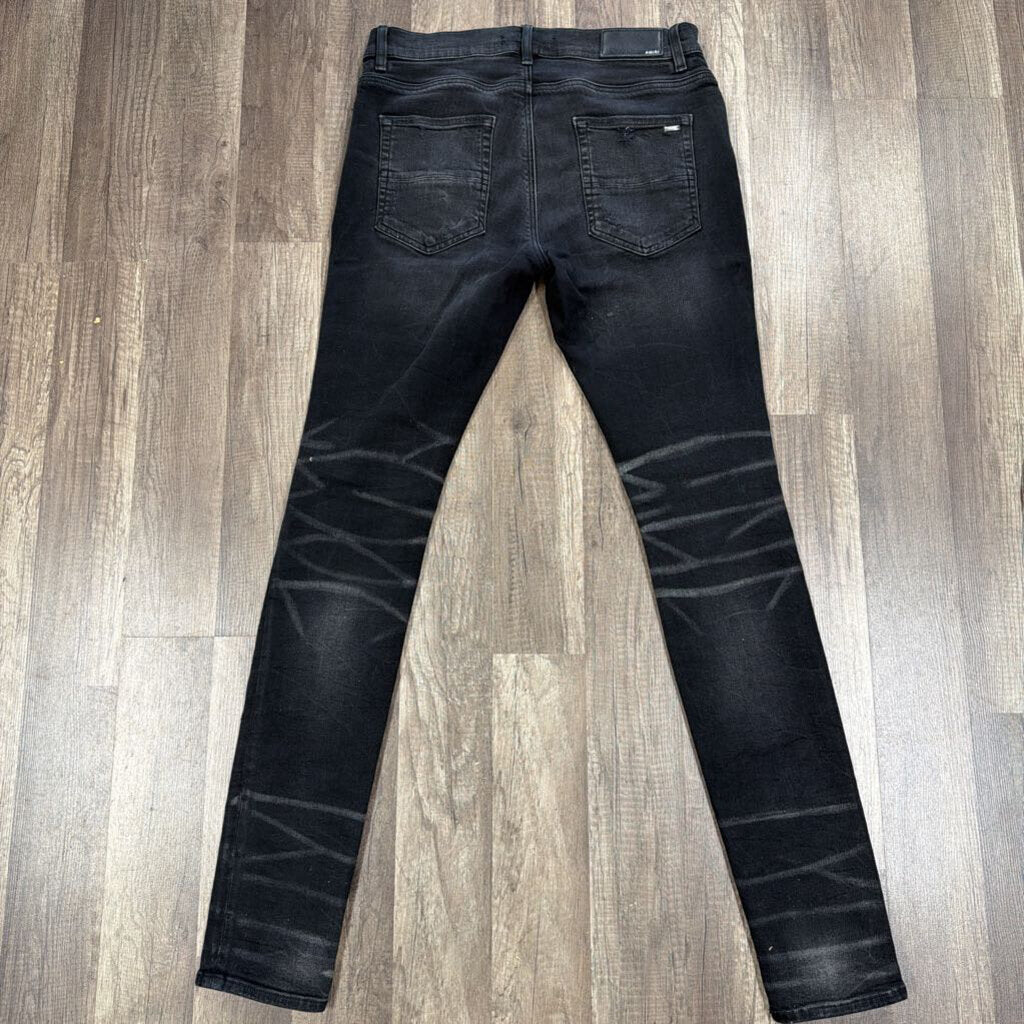 Amiri Jean Black Ripped Knee