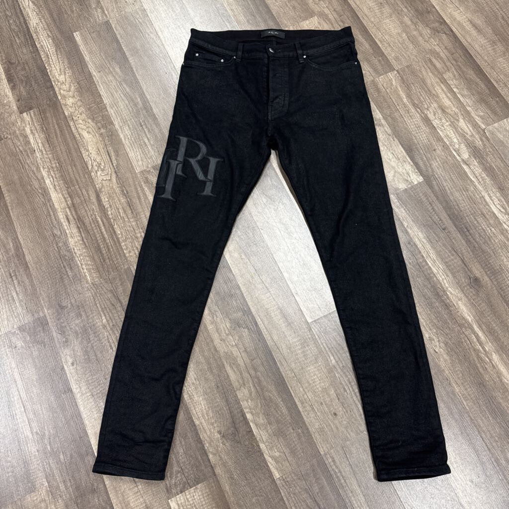 Amiri Jean Black Wax Oblique Logo