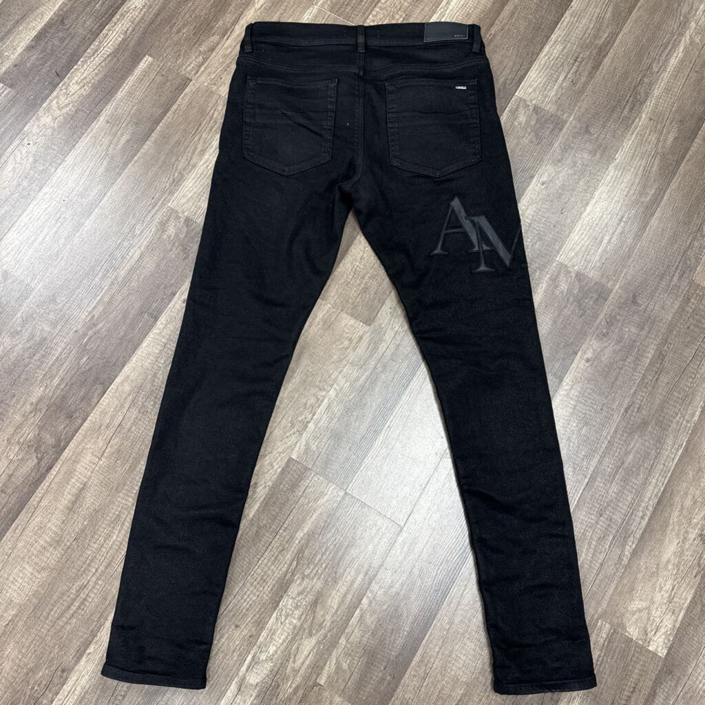 Amiri Jean Black Wax Oblique Logo