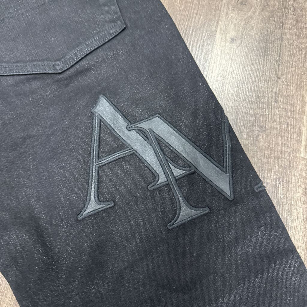 Amiri Jean Black Wax Oblique Logo
