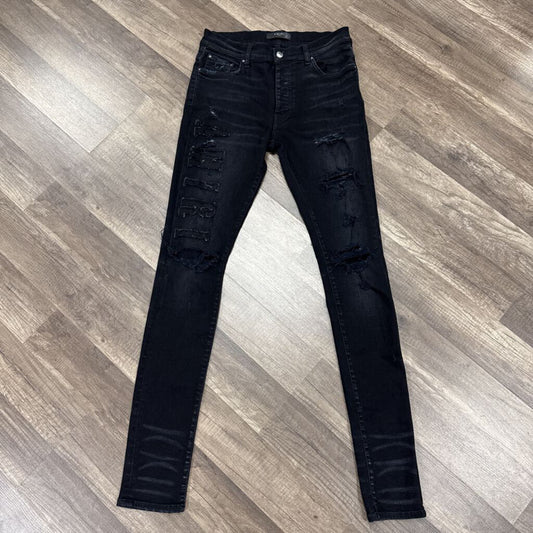 Amiri Jean Trasher Oblique Logo