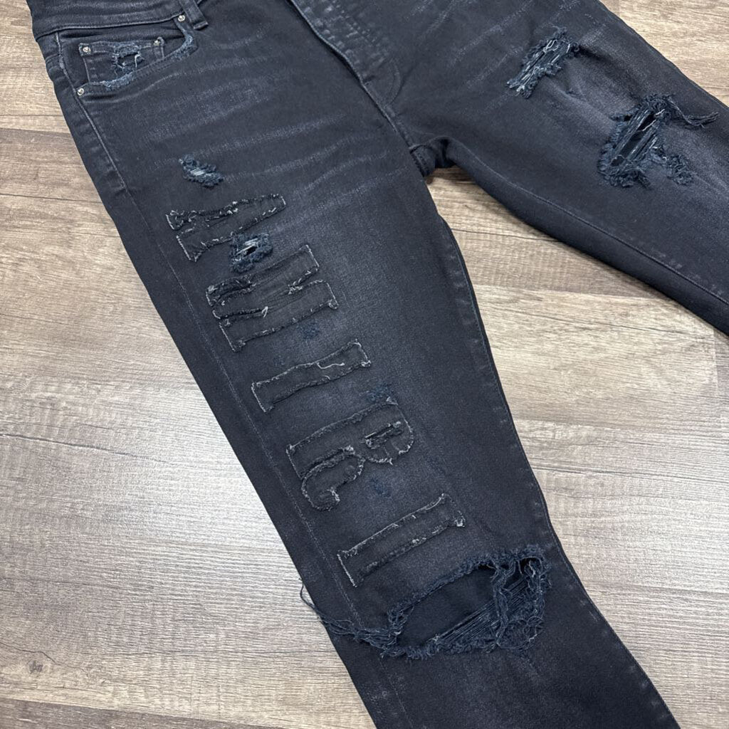 Amiri Jean Trasher Oblique Logo