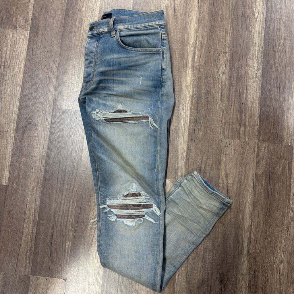 Amiri Jean Mx1 purple snakeskin